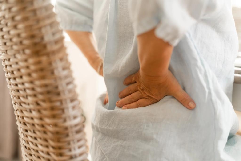 Acupuncture practitioner providing attentive care to a patient